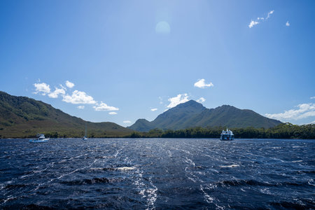 sailing on a yacht in the australian in the remote forest wilderness in spring in australia and new zealandの写真素材