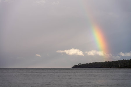 ocean with rain clouds above the sea in australia in winter