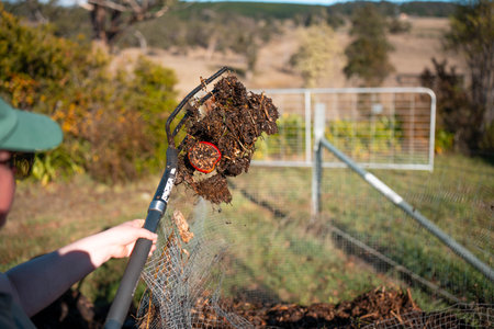 organic home Compost pile, organic thermophilic compost turning in Tasmania Australia