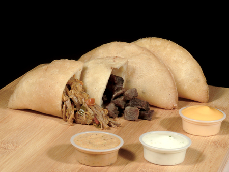 Meat and cheese empanadasの写真素材