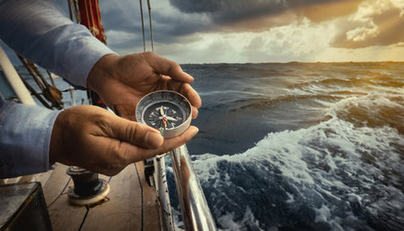 looking for the direction with the compass on the high seasの素材