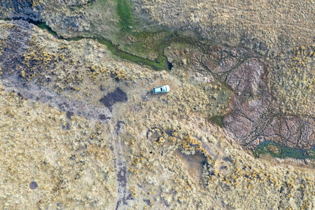 DRONE VIEW OF RIVER SOURCES IN THE HIGH ANDEAN MOUNTAINSの写真素材