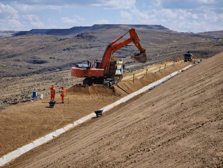 Clay cover construction process in sanitary landfills using heavy machinery,