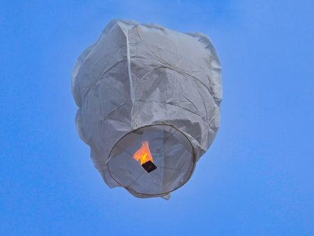 Cantoya balloon taking off in temperate weather.の写真素材
