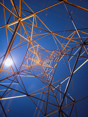 High voltage tower in long exposure night photography.の写真素材