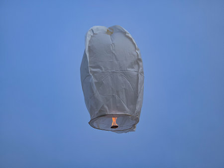 Cantoya balloon taking off in temperate weather.の写真素材