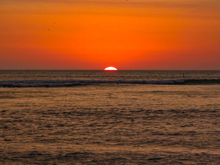 Sunset in a bay with lots of sea on a vacation trip.の写真素材