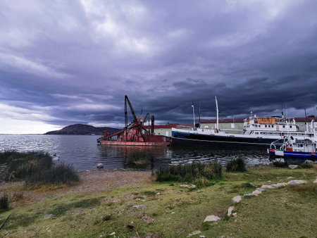 Naval ship at dock with lake view.の写真素材