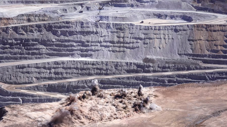 Panoramic view of the blasting process in an open pit mineの写真素材