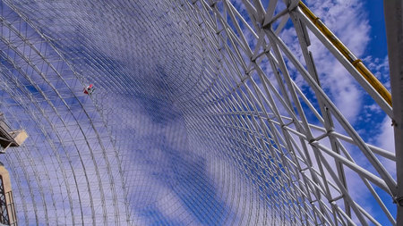Metal structures in the process of being assembled in an industrial warehouseの写真素材