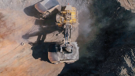 Giant excavator in a mine in the process of extracting mineralsの写真素材