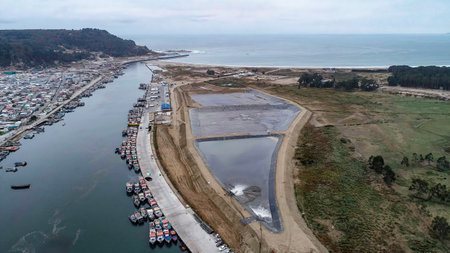 Geomembrane deployment and installation process with machinery in the construction of water poolsの写真素材
