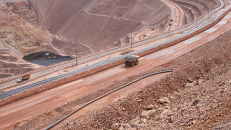 View of a huge mining truck in the process of transporting minerals from the mine to the open pitの写真素材