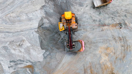 Construction machinery working in open pit mineの写真素材
