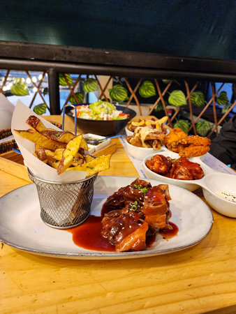 Gourmet barbecue-style dishes with side dishes