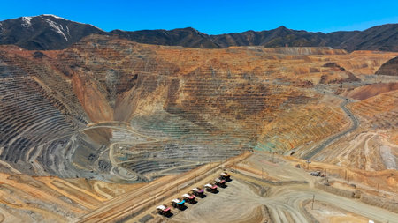 Aerial view of an open-pit mine with closed and remediated benches and mineral extraction platformsの写真素材