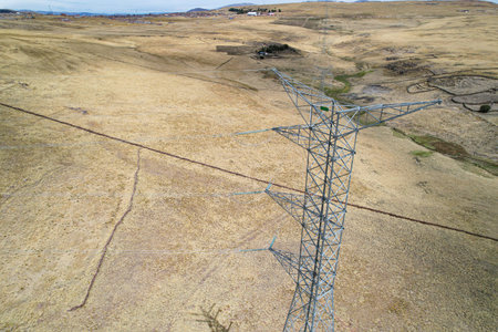 Aerial view of 400 kv high voltage towers for the transmission of electrical energy from distant...