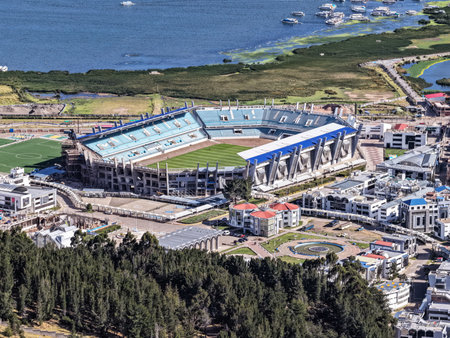 Construction process of a reinforced concrete stadium in a lakeside cityの写真素材