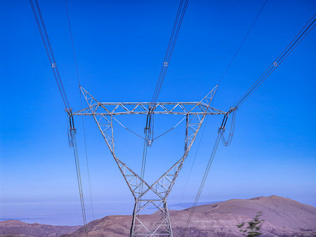 Aerial view of 400 kv high voltage towers for the transmission of electrical energy from distant...