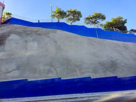 slope stabilization process with shotcrete and anchor boltsの写真素材