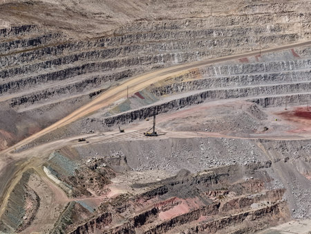Drilling and blasting process in an open-pit mine using heavy machinery