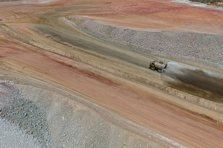 Dust control process on mine roads using water tankers to spray the roads