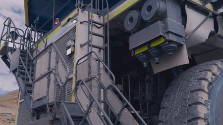 Huge CAEX mining truck parked during operator change or shift change for work in the mine