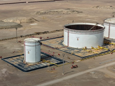 Panoramic view of huge tanks for storing biodiesel and diesel inside HDPE geomembrane spill...