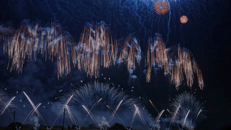 Beautiful fireworks exploding and lighting up the sky at New Year's time