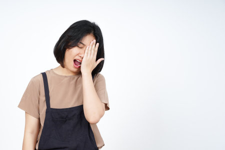 Suffering Headache Gesture of Beautiful Asian Woman Isolated On White Backgroundの写真素材