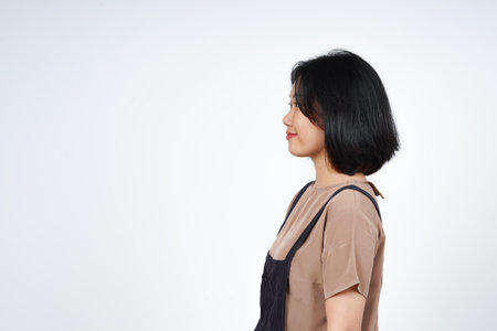 Side View Standing of Beautiful Asian Woman Isolated On White Backgroundの写真素材
