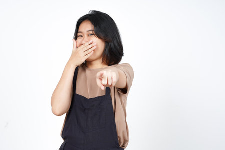 Pointing at you and Laughing of Beautiful Asian Woman Isolated On White Backgroundの写真素材