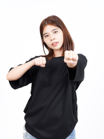 Punching fist to fight or angry Of Beautiful Asian Woman Isolated On White Backgroundの写真素材