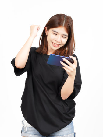 Playing Mobile Game on Smartphone Of Beautiful Asian Woman Isolated On White Backgroundの写真素材