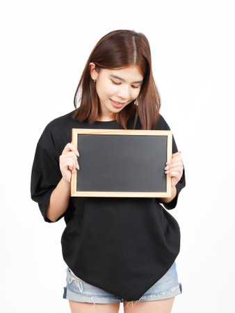 Showing, Presenting and holding Blank Blackboard Of Beautiful Asian Woman Isolated On Whiteの写真素材