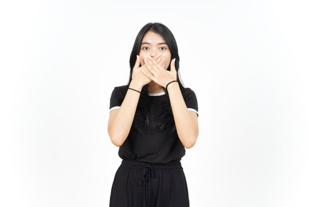 Shocked And Covering Mouth Of Beautiful Asian Woman Isolated On White Backgroundの写真素材