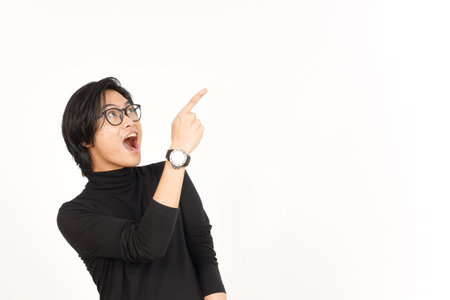 Showing Product and Pointing Side using forefinger with WOW Face Of Handsome Asian Manの写真素材