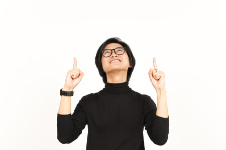 Showing Product and Pointing Up Of Beautiful Asian Man Isolated On White Backgroundの写真素材