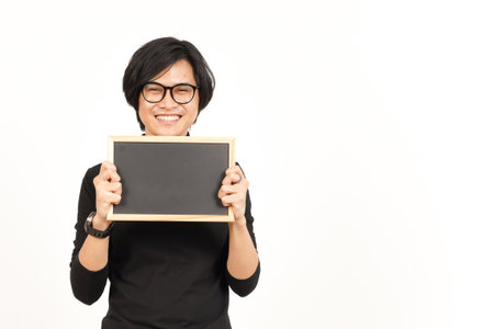 Showing, Presenting and holding Blank Blackboard Of Handsome Asian Man Isolated On White Backgroundの写真素材