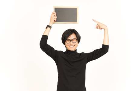 Showing, Presenting and holding Blank Blackboard Of Handsome Asian Man Isolated On White Backgroundの写真素材
