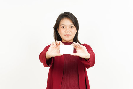 Holding and Showing Blank Credit or Bank Card Of Beautiful Asian Woman Wearing Red Shirtの写真素材