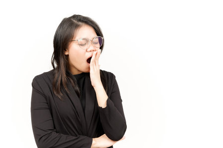 Yawning Gesture Of Beautiful Asian Woman Wearing Black Blazer Isolated On White Backgroundの写真素材