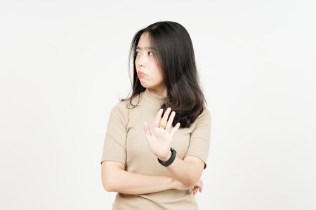 Stop or Rejection Hand Gesture Of Beautiful Asian Woman Isolated On White Background