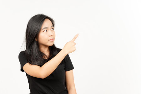 Showing Product and Pointing Side of Beautiful Asian Woman Isolated On White Backgroundの写真素材