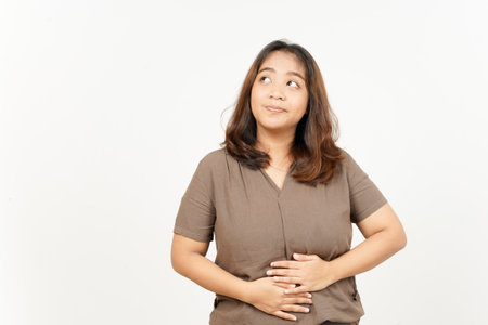 Think and touch the stomach, want to eat of Beautiful Asian Woman Isolated On White Backgroundの写真素材