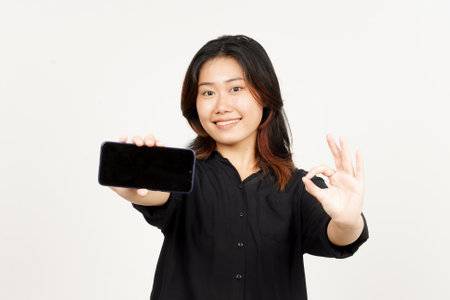 Showing Apps or Ads On Blank Screen Smartphone of Beautiful Asian Woman Isolated On White Backgroundの写真素材