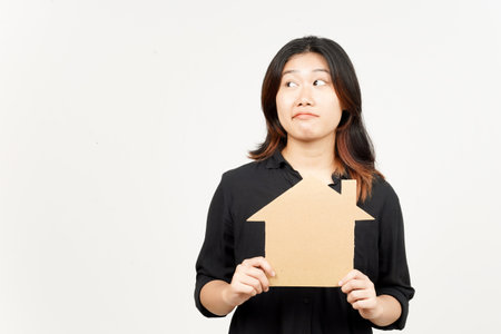 Holding House Cutout of Beautiful Asian Woman Isolated On White Backgroundの写真素材