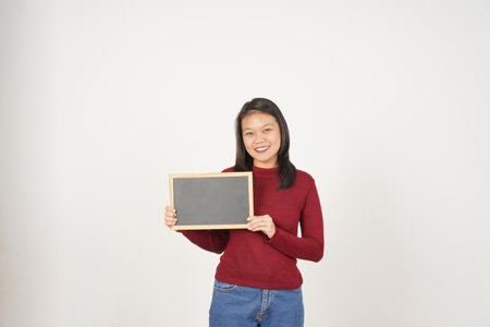 Young Asian woman in Red t-shirt Showing and holding black or chalk board sign isolated on white backgroundの写真素材
