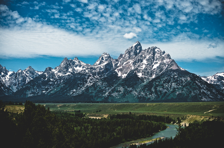 Grand Teton national park. summer vacation. landscape of mountains clouds in the skyの写真素材