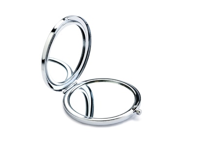 Cosmetic mirror with copy space over white background.の写真素材